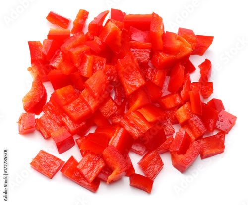 cut slices of red sweet bell pepper isolated on white background