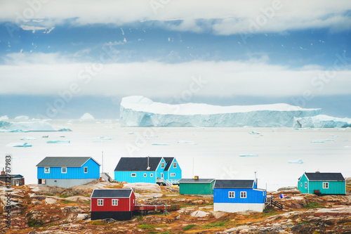 Colorful houses and bay with icebergs, Greenland © smallredgirl