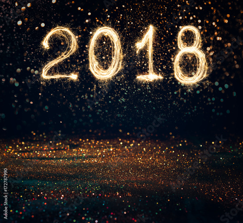 2018 written with Sparkle firework on black background , 2018 Happy New Year background concept.