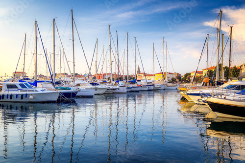 Harbor with docked boats in Porec town on Adriatic sea in Croatia, Europe. © Viliam