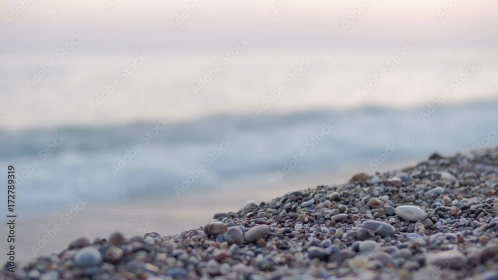 Beautiful pebble beach with large waves and foam. Beautiful pebble beach with large waves and foam.