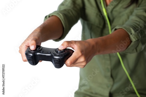 Woman playing video game against white background