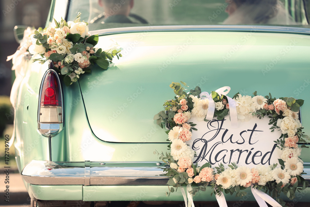 Beautiful wedding car with plate JUST MARRIED - obrazy, fototapety, plakaty 