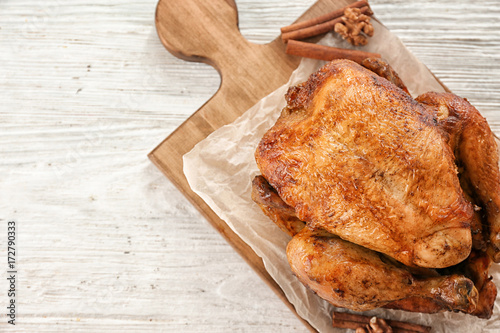 Roasted turkey on wooden board