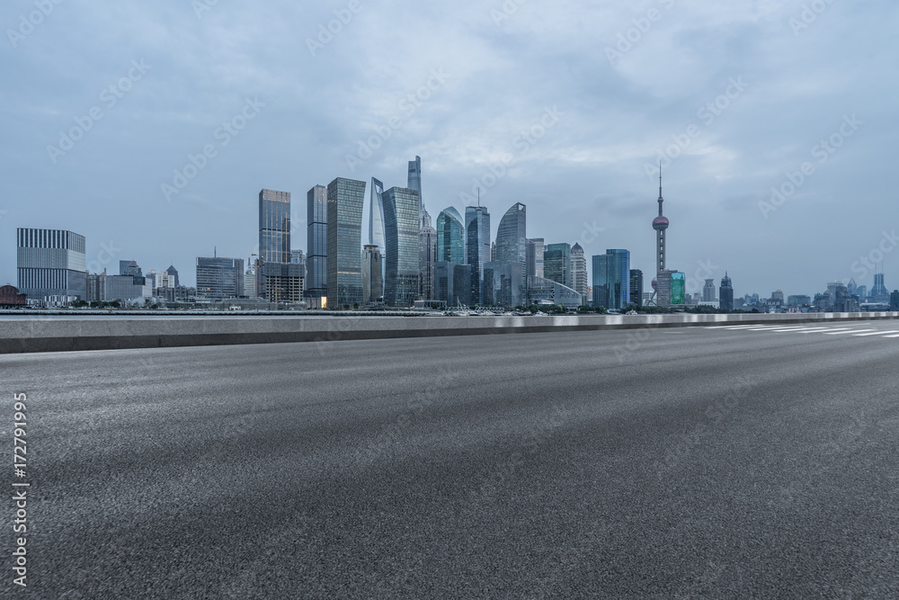 urban traffic road with cityscape in background in Shanghai,China..