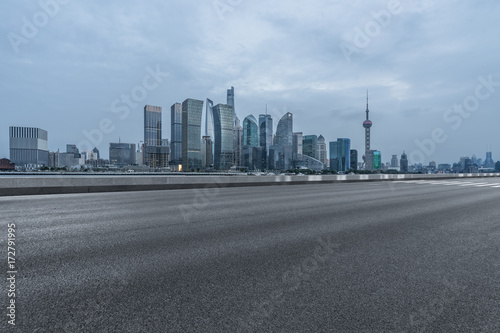 urban traffic road with cityscape in background in Shanghai China..