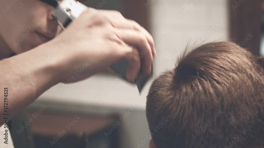 Barber haircut. Hairdressing. Close up of male hair dressing. Man haircut with electric shaver. Man getting haircut. Barber hair cut with hair trimmer. Man hairstyle Barber haircut. Hairdressing. Close up of male hair dressing. Man haircut with electric shaver. Man getting haircut. Barber hair cut with hair trimmer. Man hairstyle