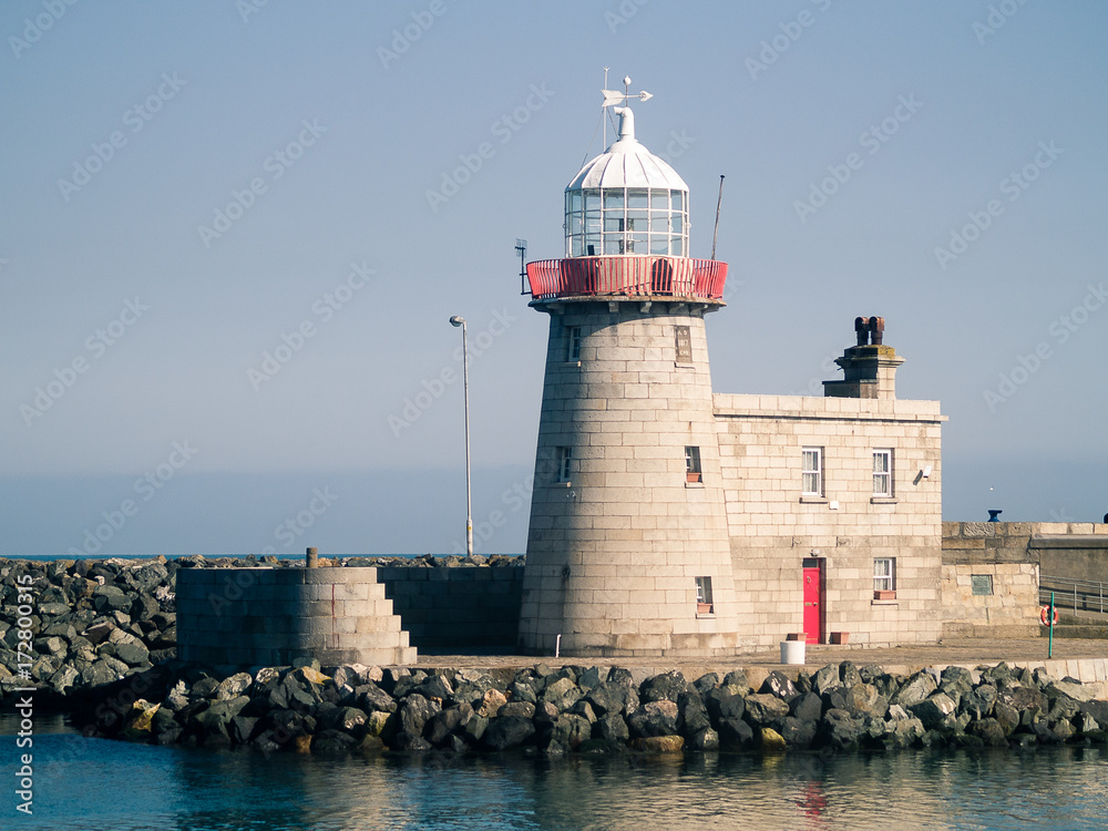 lighthouse in a harbor