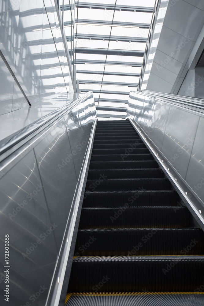 Empty escalator in modern train station. Empty escalator in modern train station.