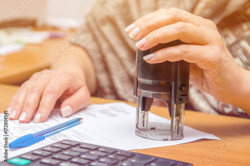 stamping documents closeup