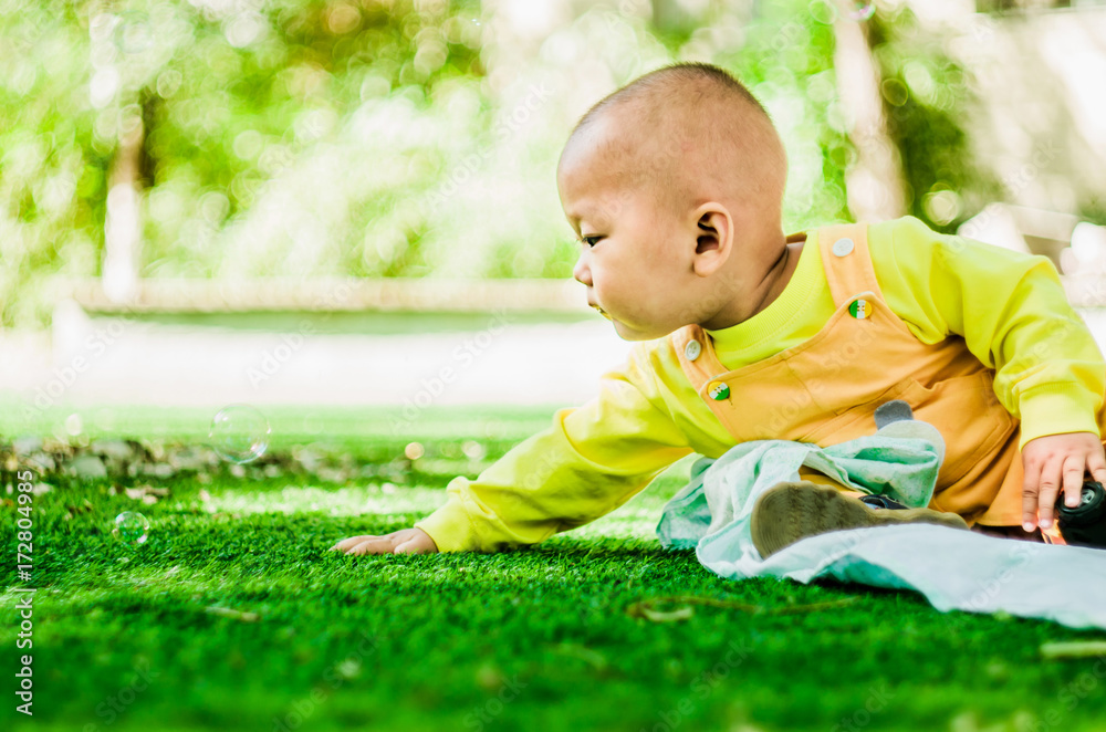 baby plays with soap bubbles baby plays with soap bubbles