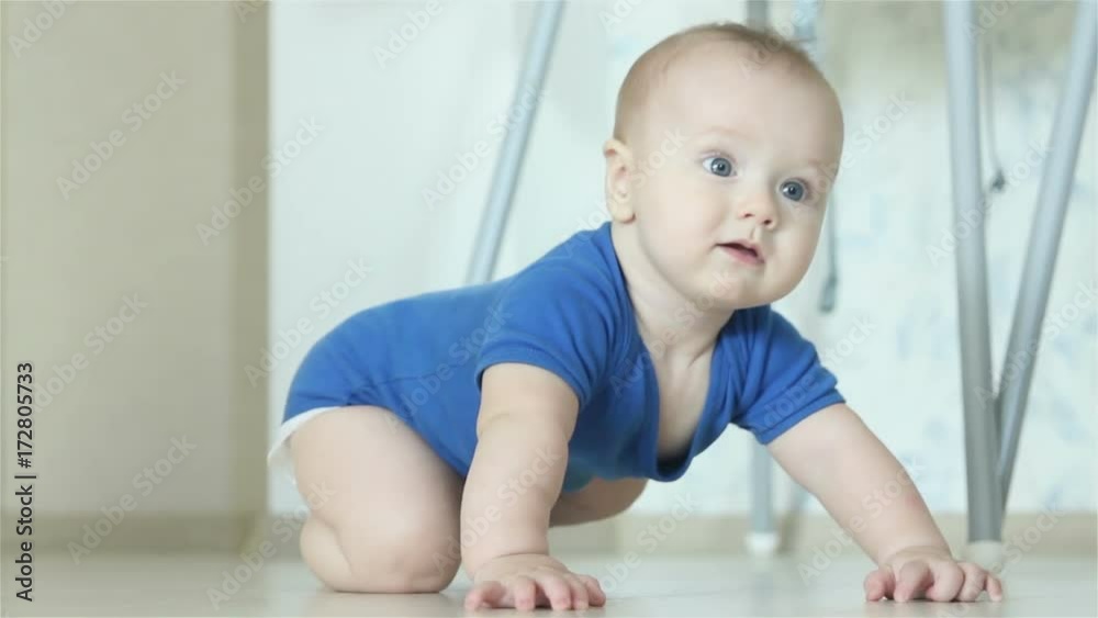 Little baby boy crawling on the floor Little baby boy crawling on the floor