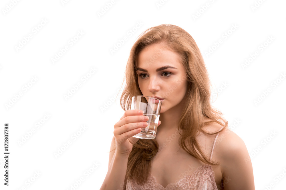 woman takes medicine pills and drinks water from glass woman takes medicine pills and drinks water from glass