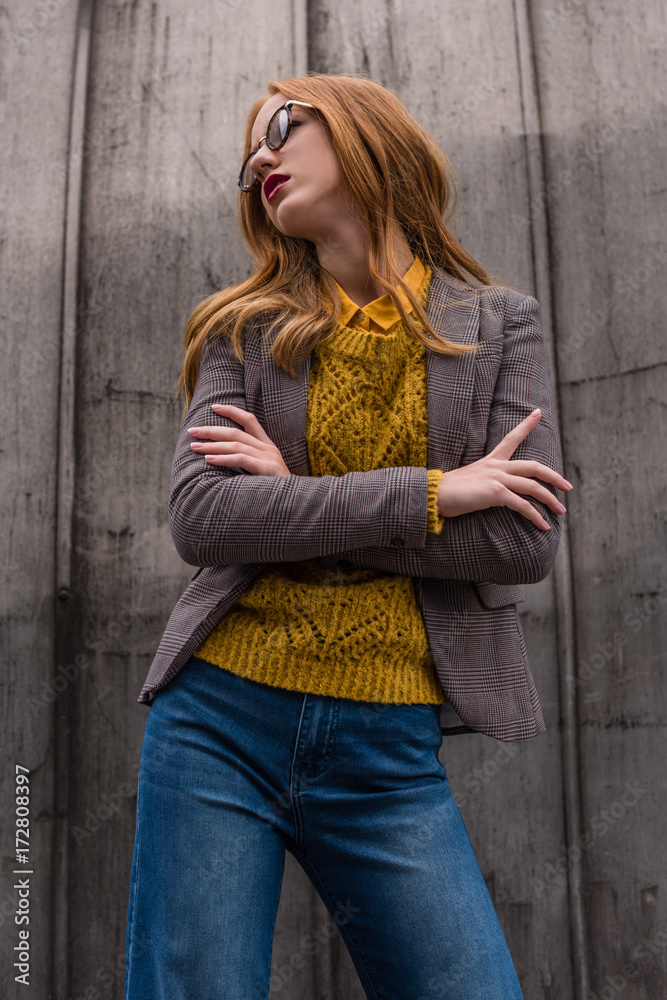 redhead girl in autumn outfit