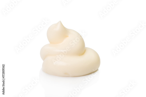 Squeezed cream isolated on white background