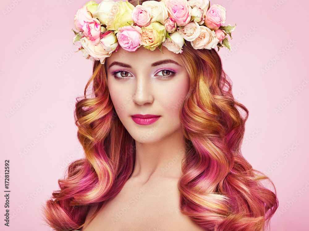 Beauty fashion model girl with colorful dyed hair. Girl with perfect makeup and hairstyle. Model with perfect healthy dyed hair. Flower wreath on head