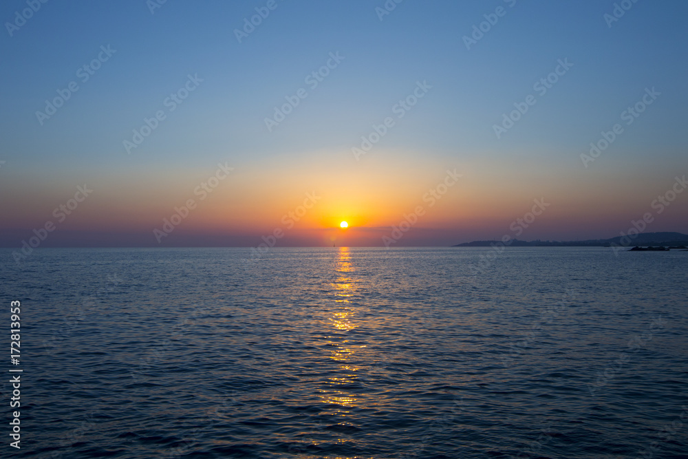  Landscape of Sunset fishing silhouettes of fishermen near the sea coast 