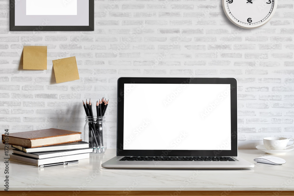 Fototapeta premium Stylish workspace with laptop computer, office supplies gadget at home or studio office. Desk space Mock up blank screen for graphic montage.