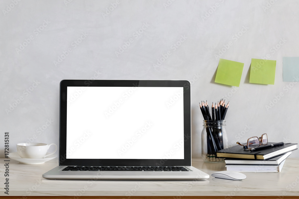 Fototapeta premium Stylish workspace with laptop computer, office supplies houseplant at home or studio office. Mock up Desk space blank screen for graphic montage.