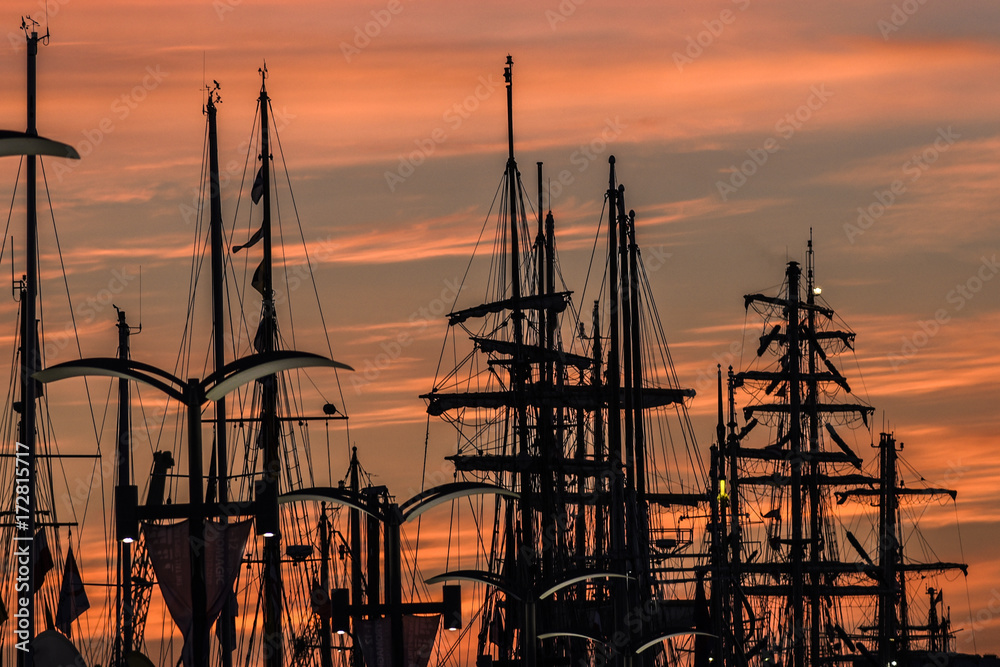 Masts of yachts at sunrise in port at the finale of The Tall Ships Races 2017 in Szczecin