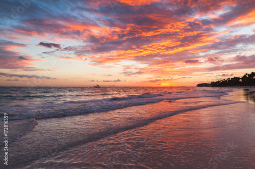 Colorful clouds in sunrise over Atlantic Ocean © evannovostro