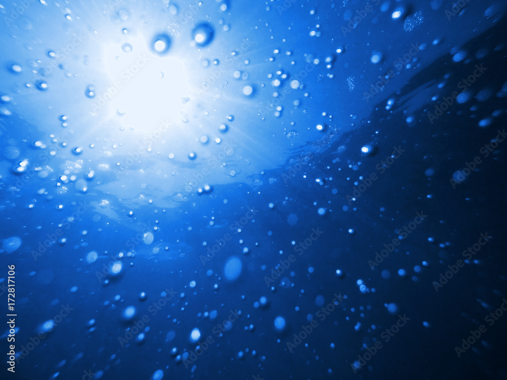 Water bubbles and sunlight underwater Water bubbles and sunlight underwater