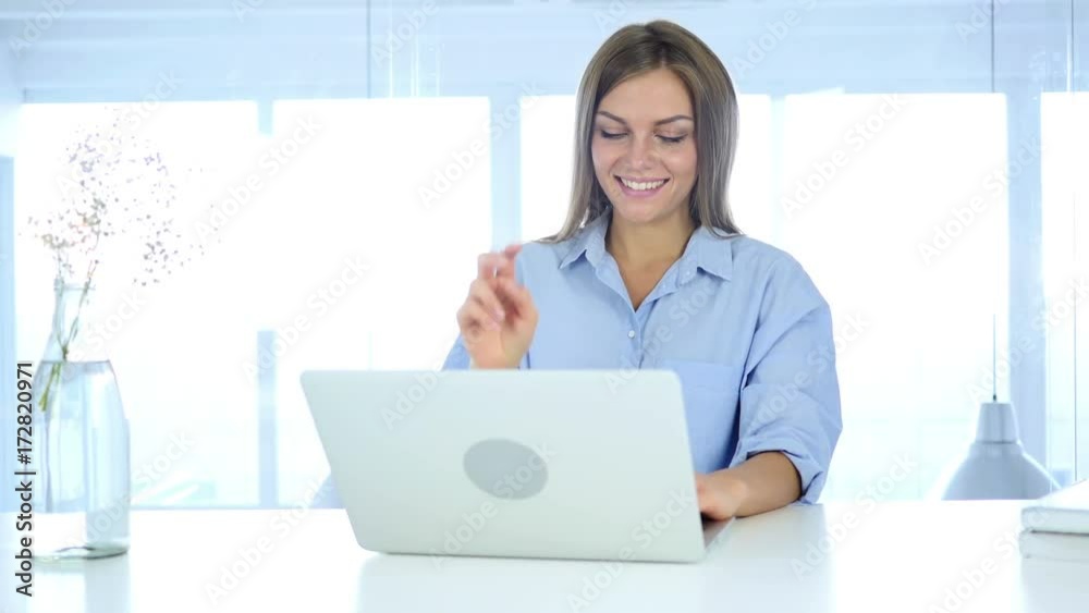 Portrait of Beautiful Young Woman Gesturing Victory Sign Portrait of Beautiful Young Woman Gesturing Victory Sign