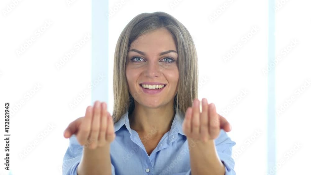 Portrait of Beautiful Young Woman Inviting Customers with Both Hands Portrait of Beautiful Young Woman Inviting Customers with Both Hands