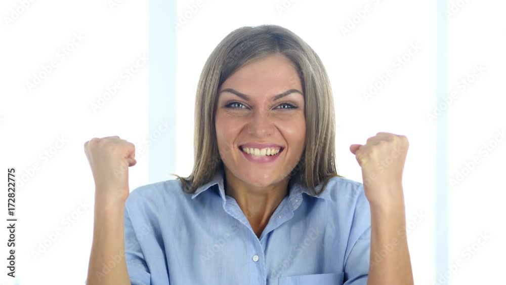 Portrait of Beautiful Young Woman Celebrating Success Portrait of Beautiful Young Woman Celebrating Success