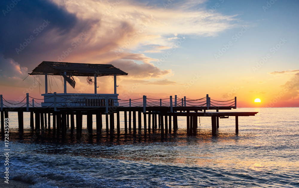 Romantic view of the pier at sunset used for natural background Sea. Romantic view of the pier at sunset used for natural background Sea.