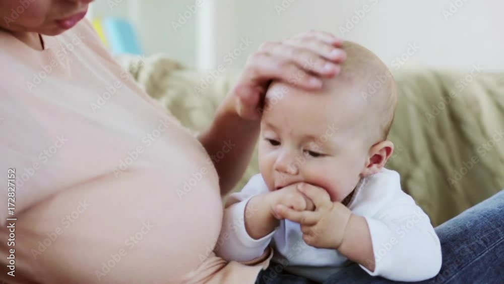 happy young mother with little baby at home happy young mother with little baby at home