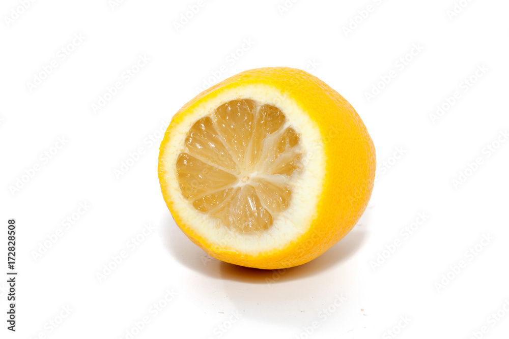 lemon on cutting board on white background lemon on cutting board on white background
