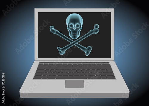 laptop computer hacked displaying a skull and cross bones