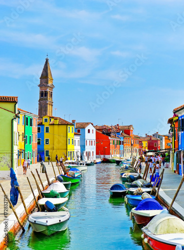 View of the colorful Venetian houses along the canal at the Islands of Burano...