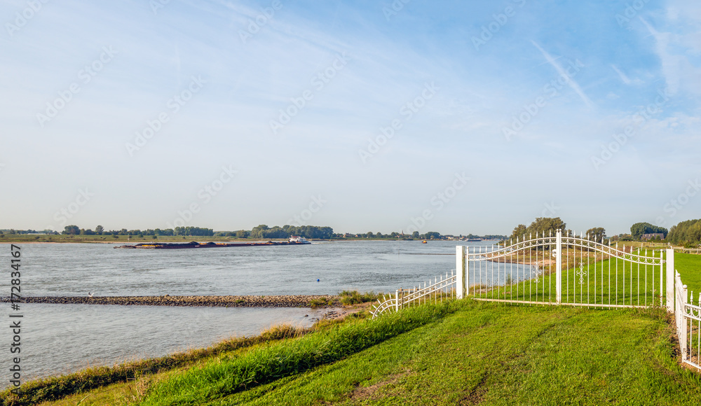 Wide Dutch river in the late summer season