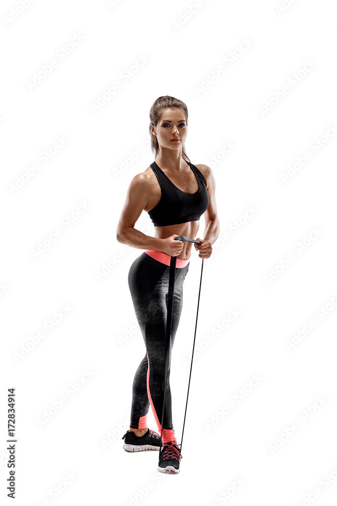 Woman exercising fitness resistance bands in studio silhouette isolated on white background Woman exercising fitness resistance bands in studio silhouette isolated on white background