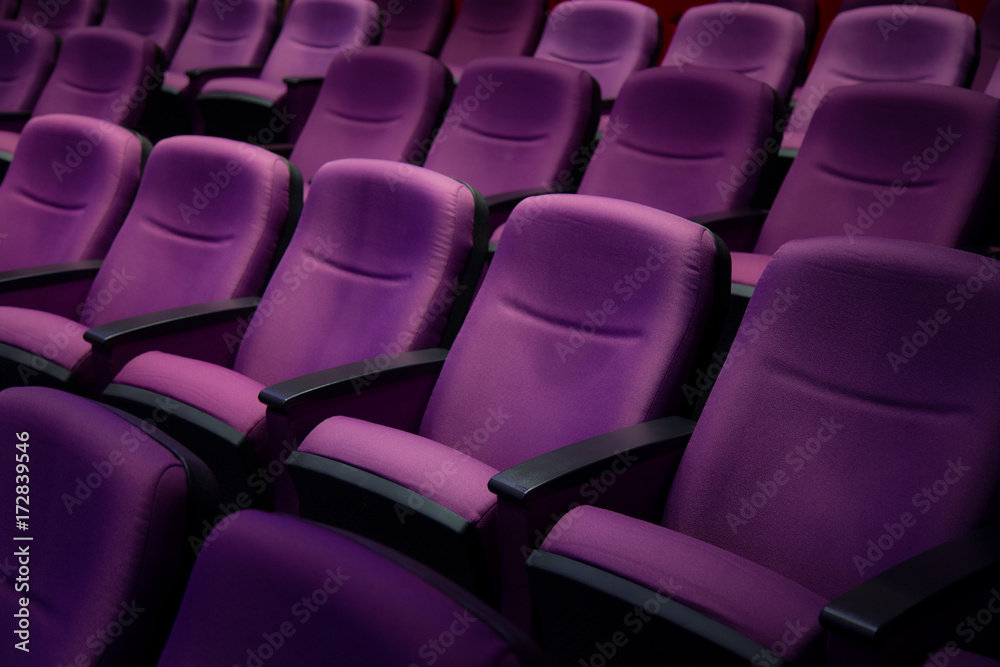 Fototapeta premium Purple comfort seat in theater.