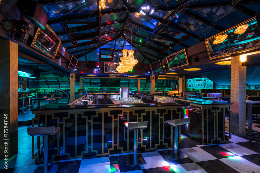 Caffe bar interior with skylight by night - obrazy, fototapety, plakaty 
