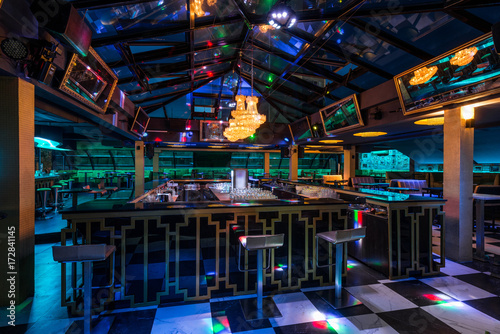 Caffe bar interior with skylight by night