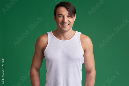 sporty man isolated on green background