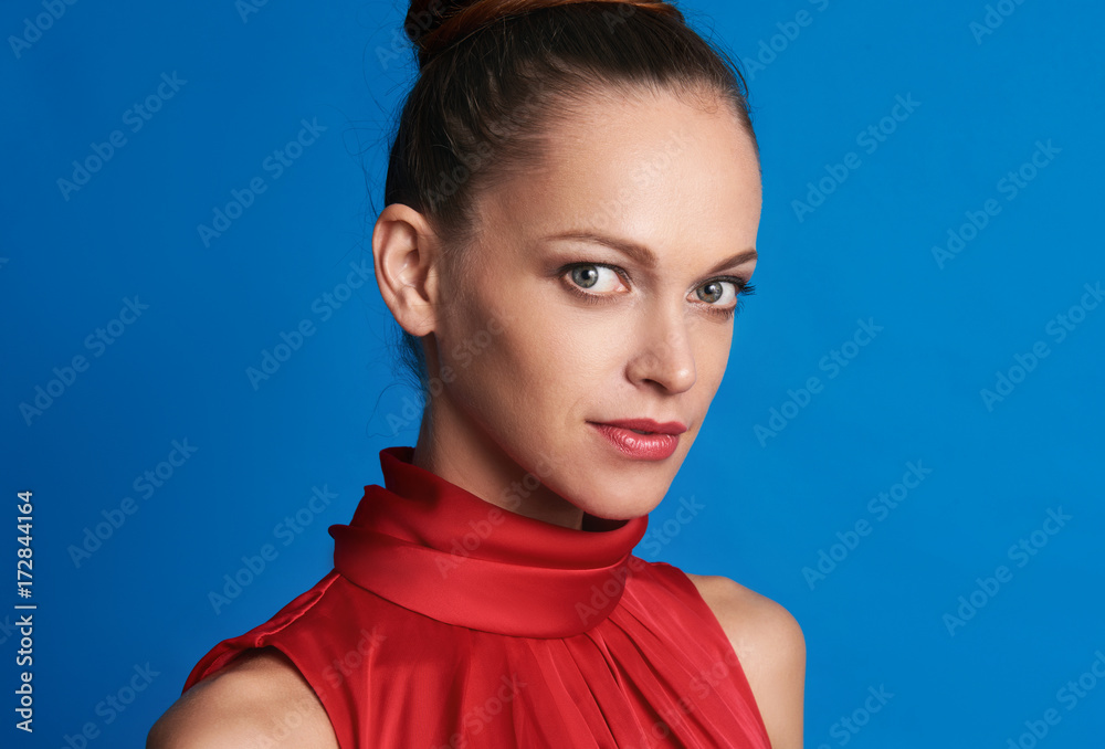 Portrait of pretty girl over blue background Portrait of pretty girl over blue background