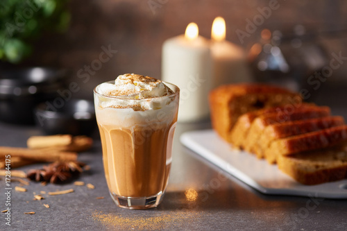 Glass of pumpkin spice lattes with cinnamon