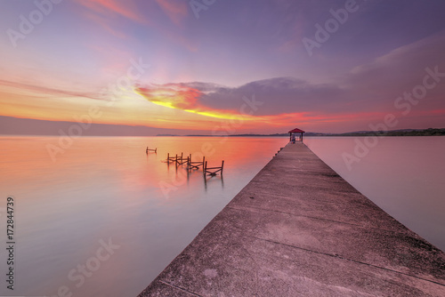 Fototapeta Naklejka Na Ścianę i Meble -  Amazing sunset at fisherman jetty in Malaysia