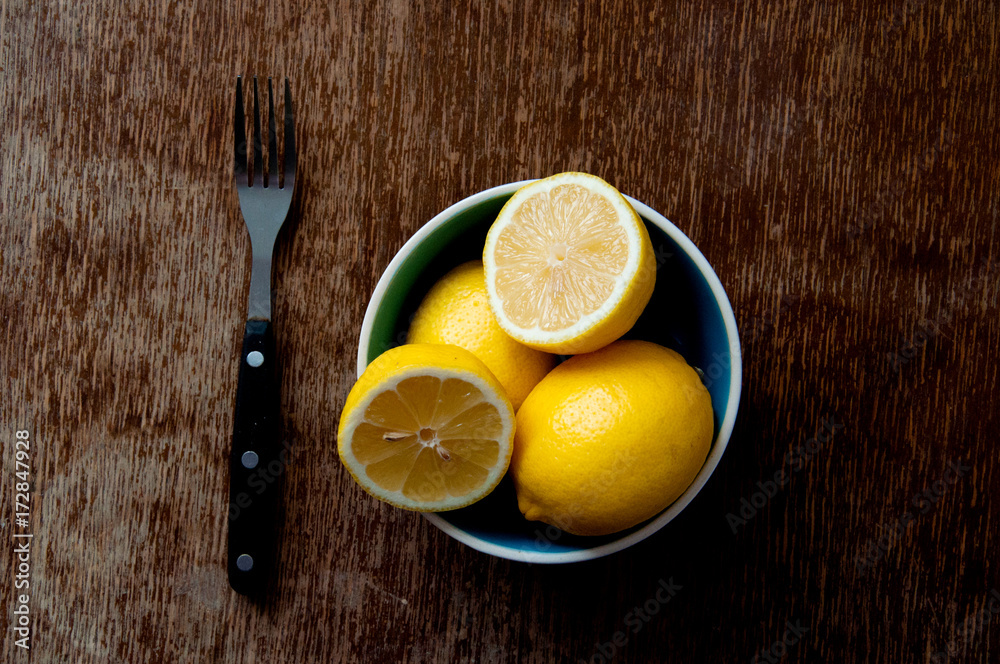lemon on a wooden board lemon on a wooden board