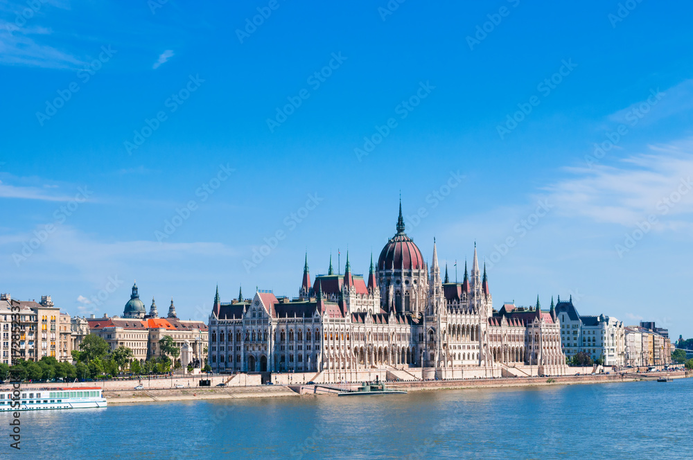 Hungarian Parliament on the embankment of Danube river in Budapest, Hungary Hungarian Parliament on the embankment of Danube river in Budapest, Hungary