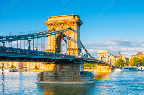 Chain bridge across the Danube river at sunset in Budapest, Hungary