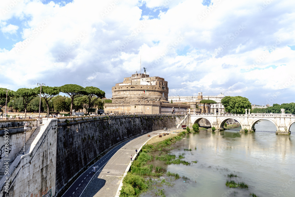 Panoramic view of the castle of San Angelo and the bridge of San Angelo on the river Tiber, from the street called 