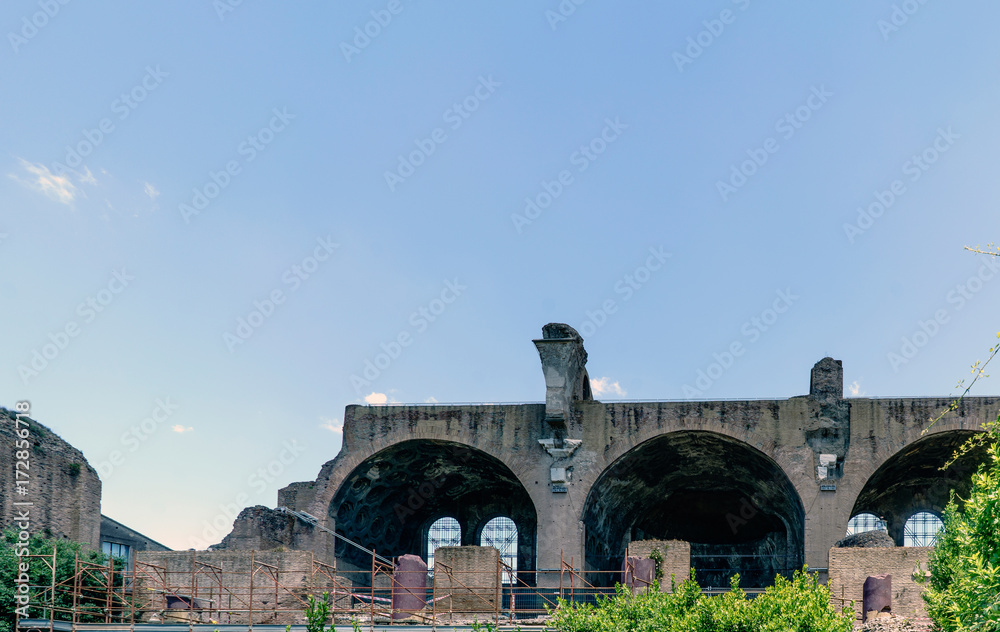 Partial view of the ruins Basilica of Maxentius and Constantine located in the ruins of the forum of the time of the Roman Empire