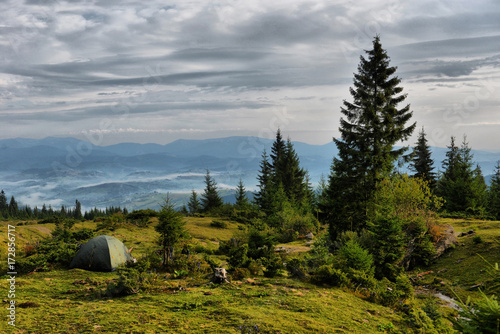 Carpathian mountains autumn landscape with blue sky and clouds