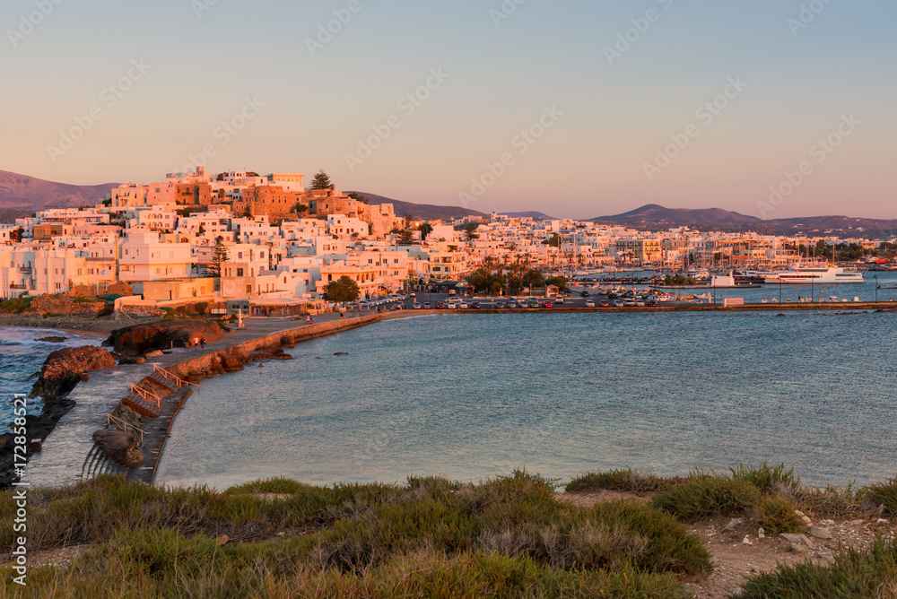 View of Chora town in sunset light. Naxos island. Cyclades, Greece.	